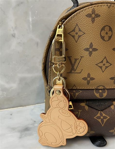 louis vuitton panda keychain|More.